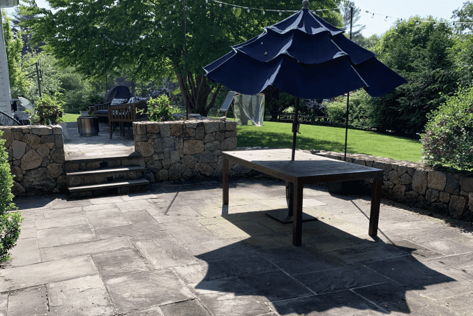 Patio hardscape before power washing — Fairfield County, CT
